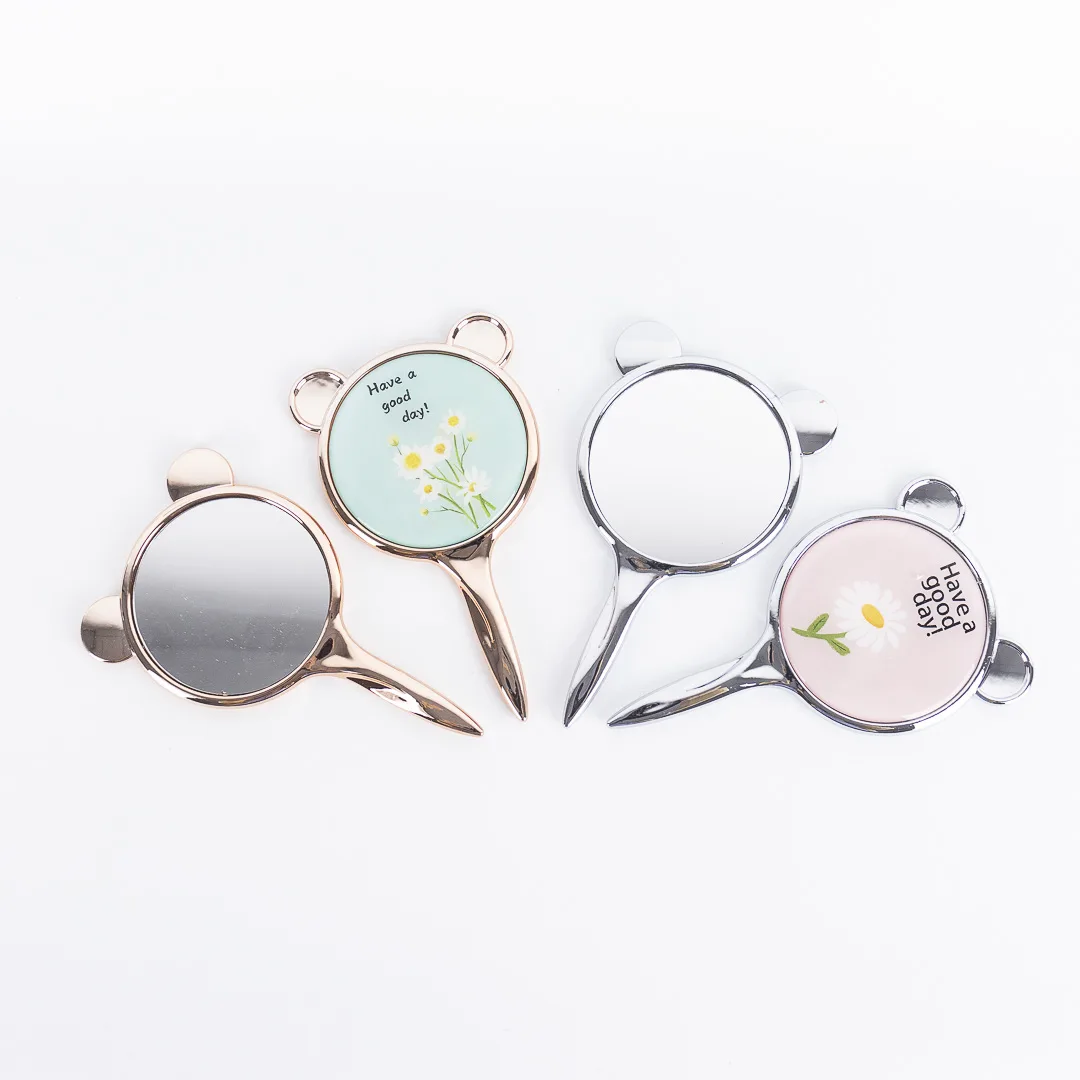 ESPEJO CON MANGO Y OREJITAS