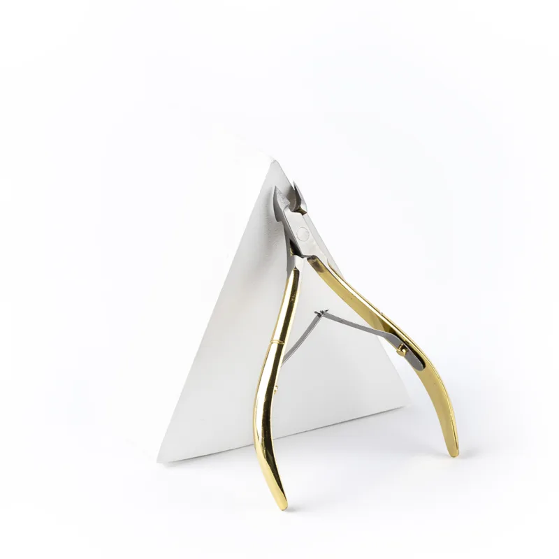 CORTA CUTÍCULAS DORADO