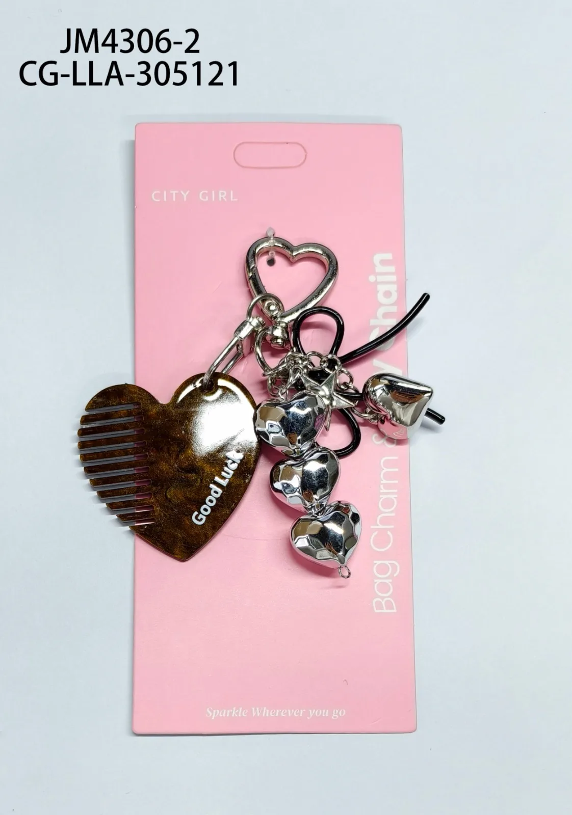 LLAVERO CHARMS PEINE MARRON